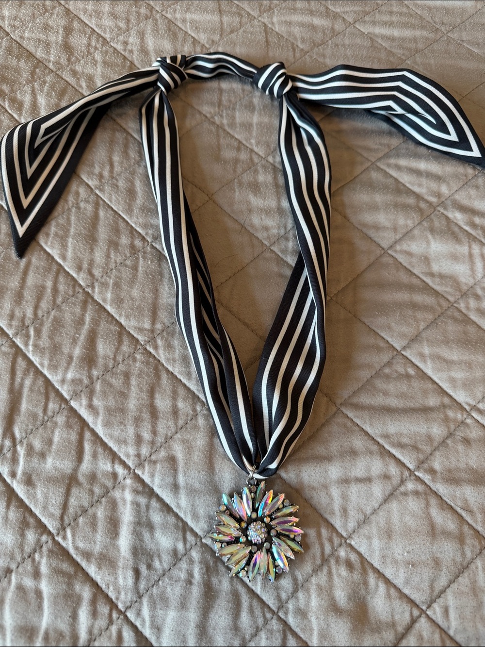 Black & White Striped Ribbon Necklace with Iridescent Floral Pendant